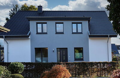 Dachaufstockung und Sanierung zum Effizienzhaus nahe Bremen in Niedersachsen